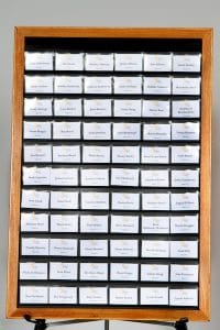 oak frame name badge organizer for event hosting with name tags displayed